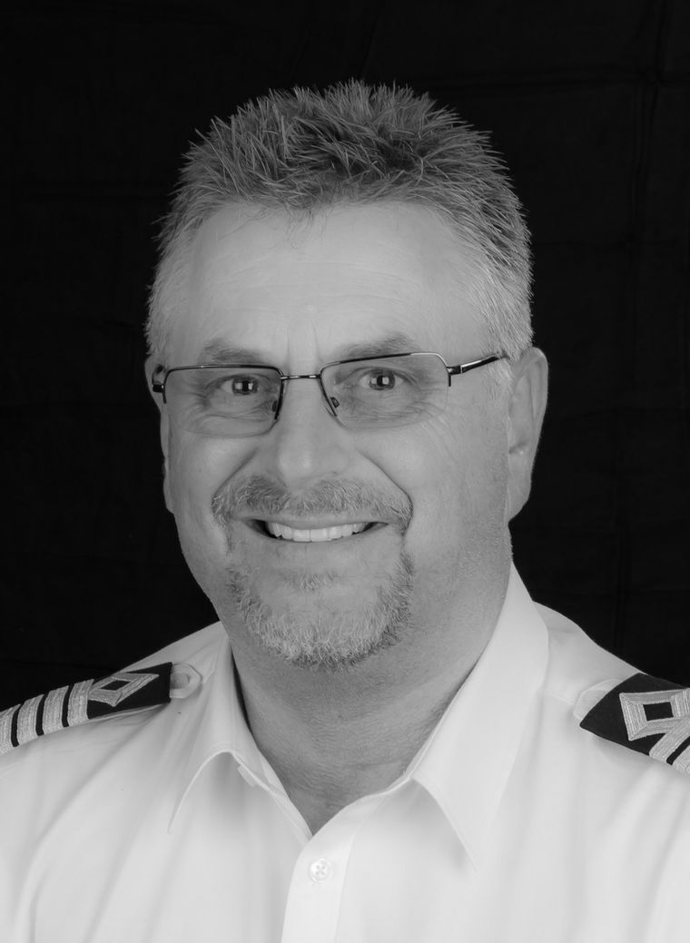 The Captain — serving ship's master